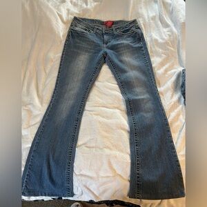 red rivet size 11 jeans with minor stain in back not sure if it washes off